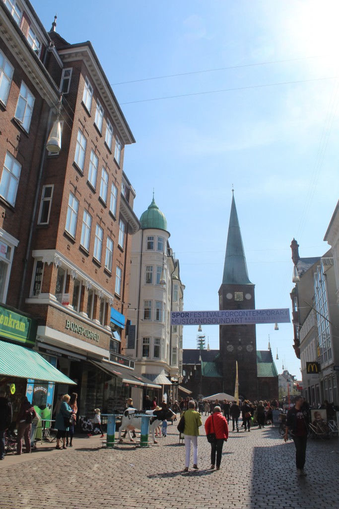 Store Torv with Borgporteb at left - the entrance to old city of Aarhus. Photo in direction to Aahus Cathedral "Domkirken". Photo 7. may 2016 by