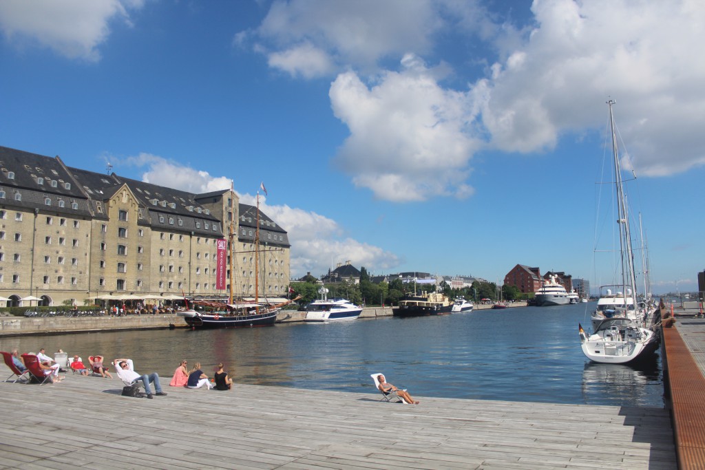 Ofelia Place on Quay Kvæsthusbroen, Copenhagen Inner Harbour. View to Admiral Hotel, former stier House built 1770, Amaliehaven and 2 more store houses built 1770-80. Photo 20. july 2016