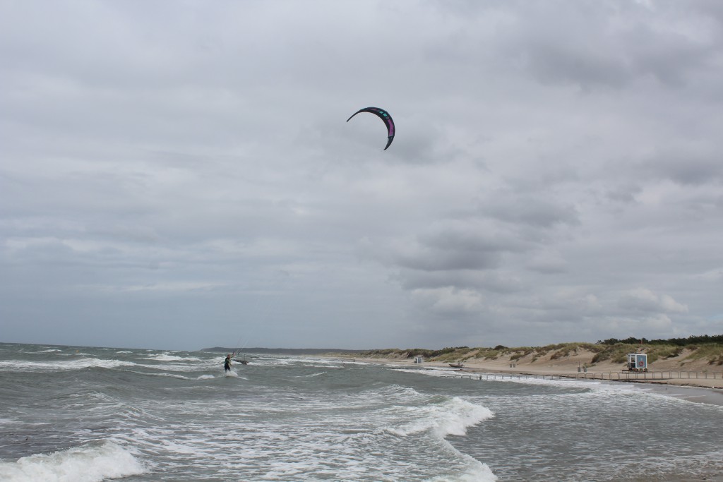 Liseleje Beach, North sealant. A kitesurfer from Holland on his way to a brak a