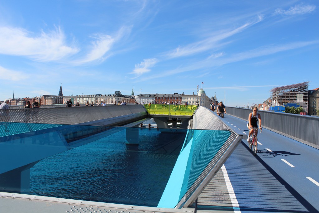 Inderhavnsbroen - new bike-, walk and run slide bridge passing Copenhagen Inner harbour between Nyhavn/Havnegade go Grø