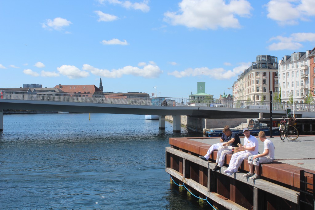 Copenhagen Inner Harbour. Relaxed atmosphere at lunch time on bulwark at NYhavn Canal. Photo 6. june 2016 by Erik K Abrahamsen.