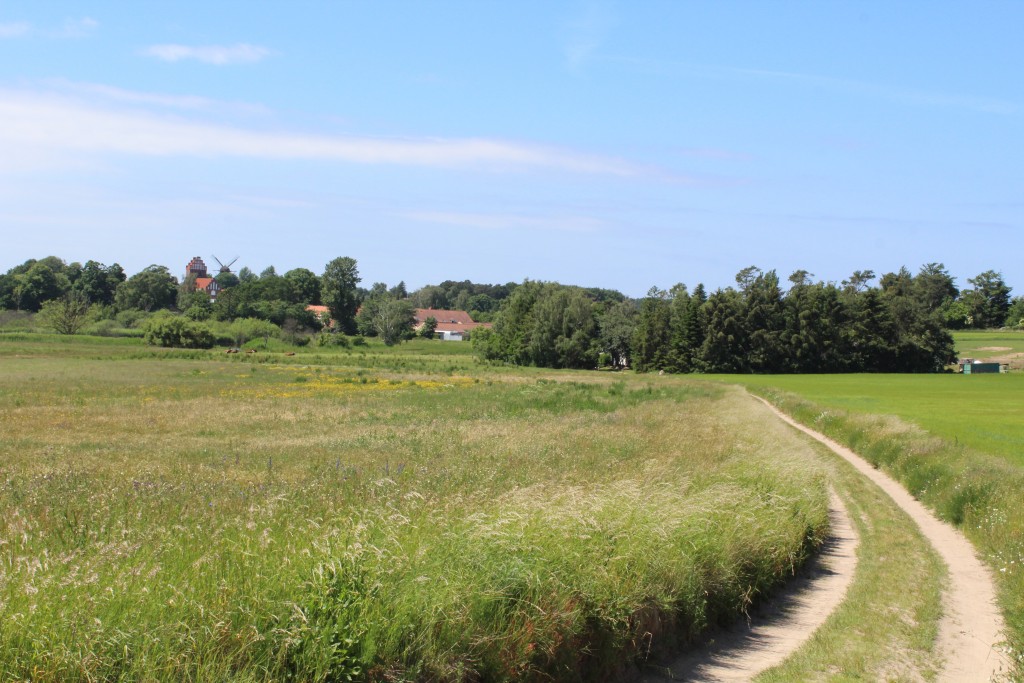 Udsigt mod melby Kirke opført i 12oo-tallet og melby Mølle opført 1879