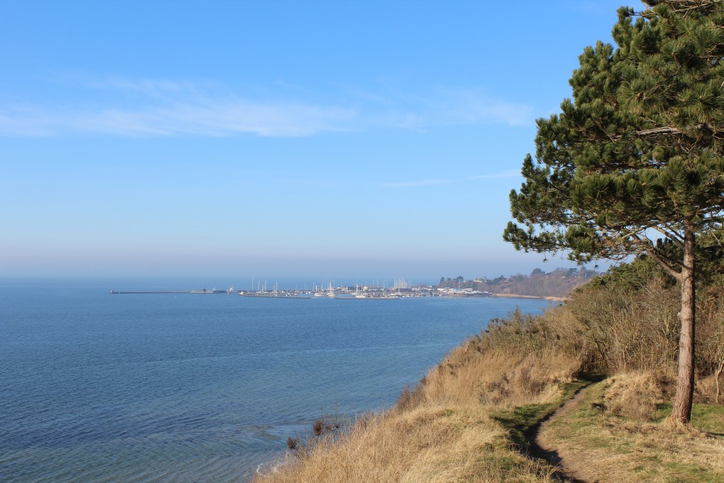 View in direction west from top of Karlsminde slope to Roskilde Fjord, isefjord and Lynæs Harbour.