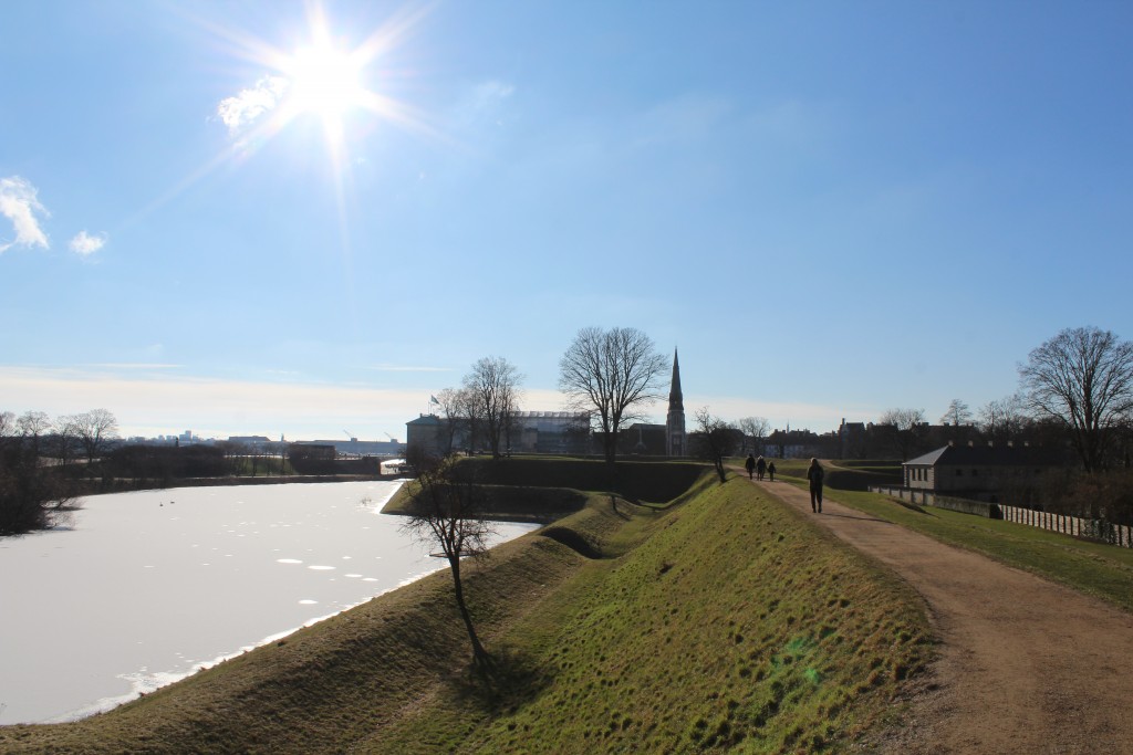 Fortress Kastellet with ramparts and moats. View in direction south to Copehagen Inner Harboru with 2 cranes of former shipyard of Naval Base Holmen (1680-1989). Phoot 22. february 2018 by Erik K Abrahamsen.