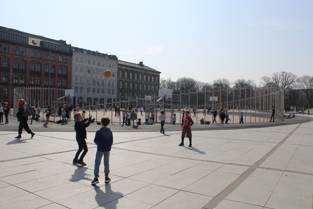 Schoolchildern from neighboring school - free play in open space on Israel Square.