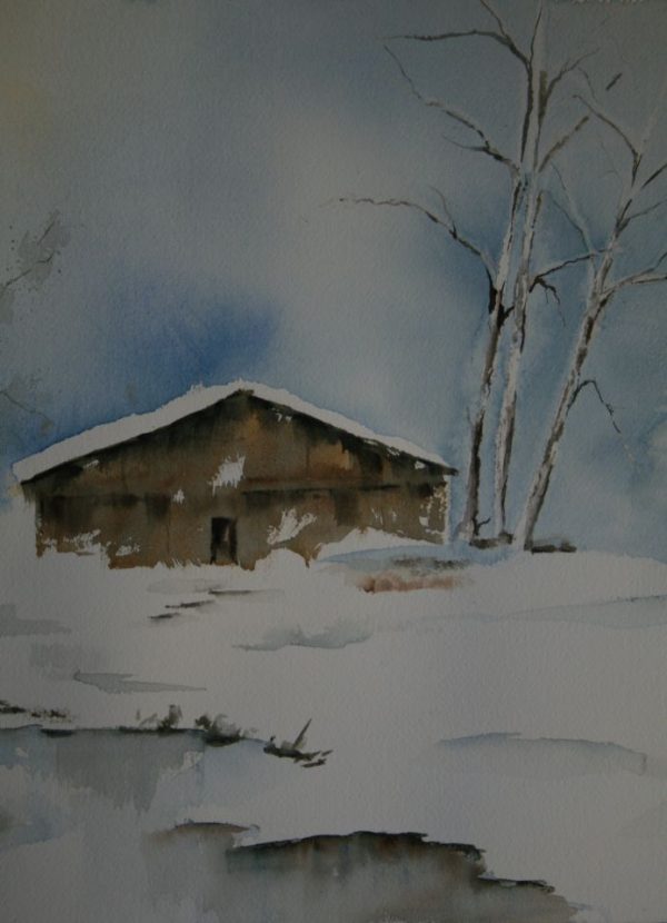 Chalet sous la neige