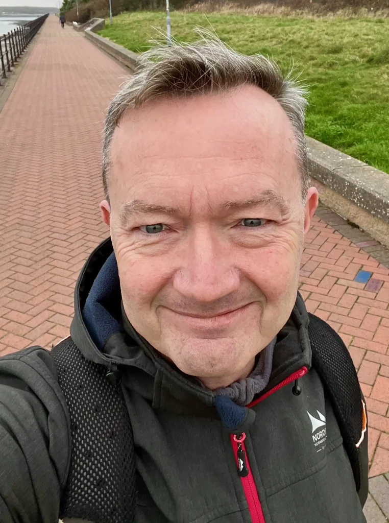 Tom Antonsen on a beach promenade in Barrow-in-Furness, England.