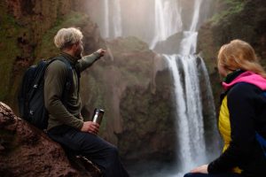 adventurer couple near ouzoud waterfall in morocco