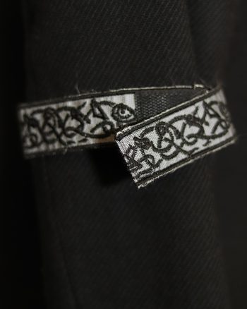 Attachable embroidered reflective ribbon in grey