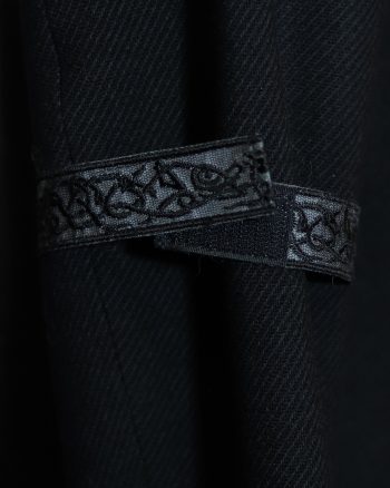 Black embroidered reflective ribbon, attachavle at sleeve or leg