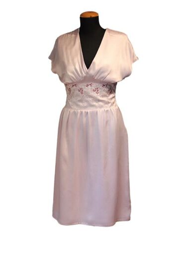 Light pink silk dress with embroidery at waist