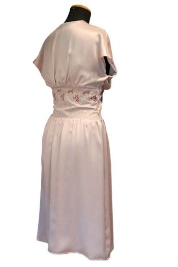 Light pink silk dress with embroidery at waist back view