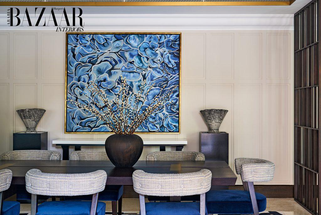 Magical Moments: Inside Jumeirah Dar Al Masyaf ’s Newly Revived Malakiya Villas 22 Clean lines are brought forth in the wall mouldings and room divider, while curvature in the chairs and bespoke artwork softens and balances the design elements