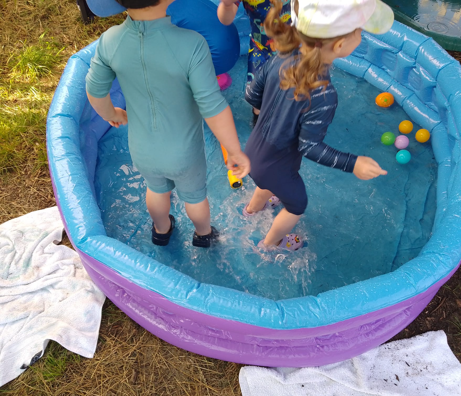 Children playing in the paddling pool
