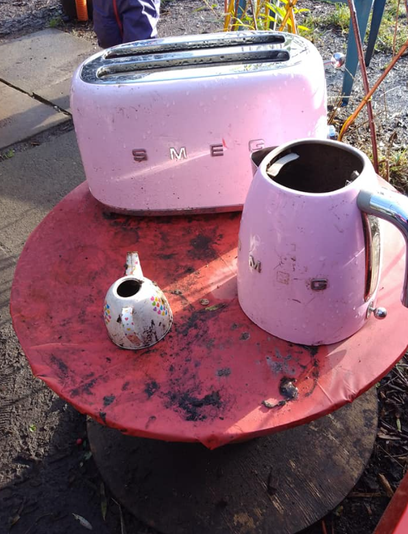 Our mud kitchen's kettle and toaster
