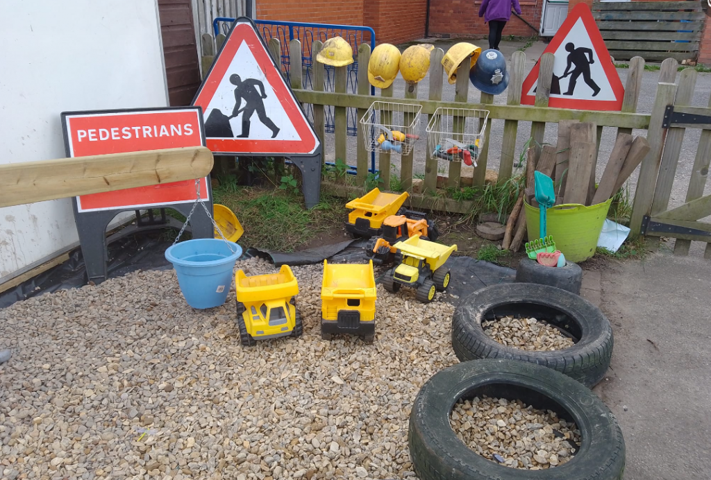 Construction zone at Dodleston Pre-School with tyres and roadwork signs