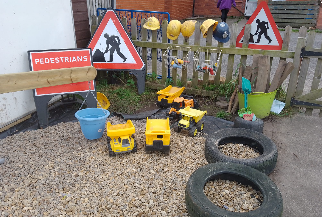Construction zone at Dodleston Pre-School with tyres and roadwork signs