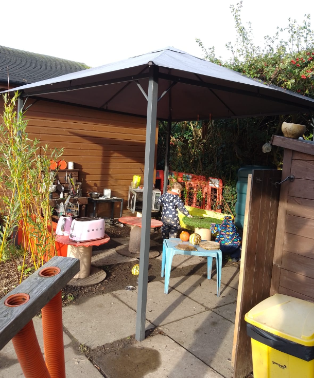 Our mud kitchen complete with kettle and toaster