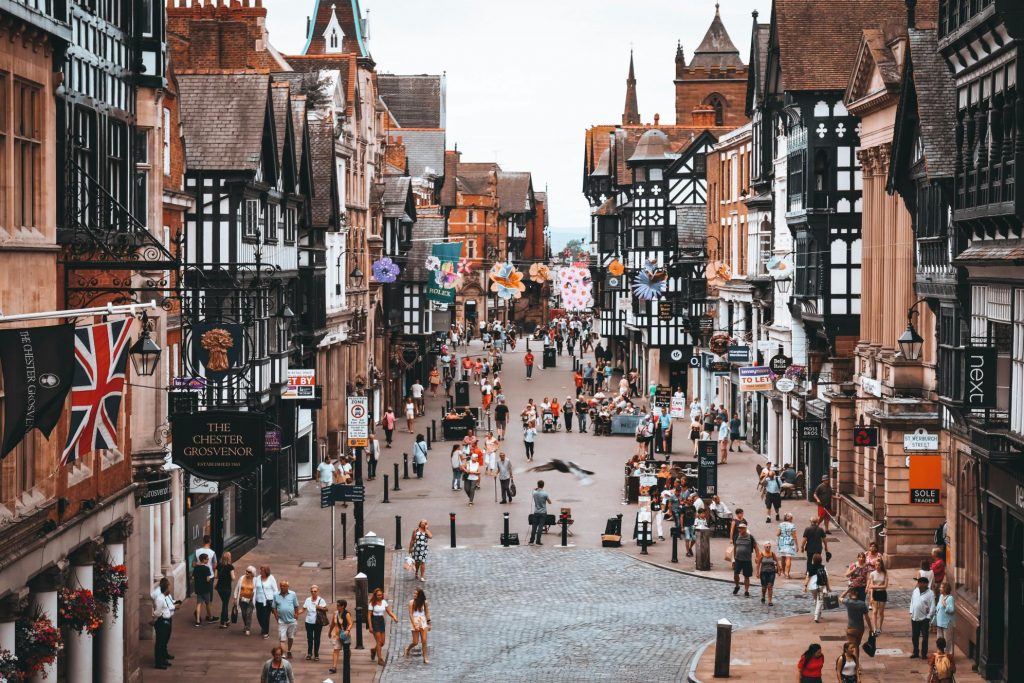 Chester city centre full of shoppers on a cloudy day