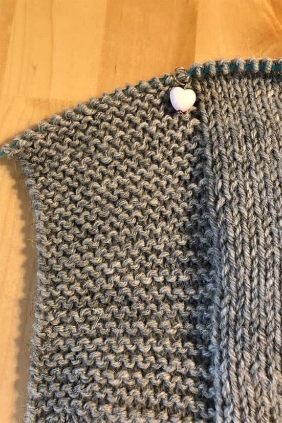 A project in stockinette stitch with an edge knitted in garter stitch to prevent the edges from curling.