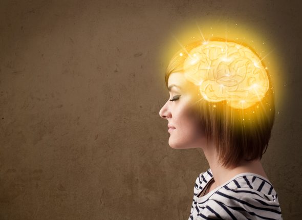 Young,Girl,Thinking,With,Glowing,Brain,Illustration,On,Grungy,Background