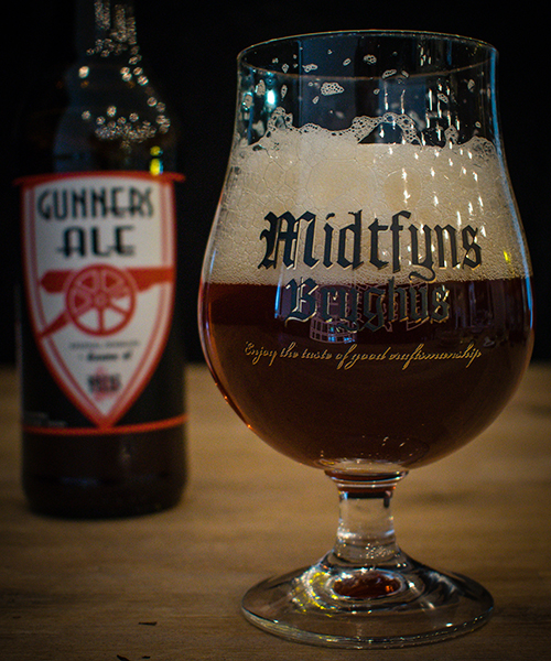 Gunners ale er en rød velsmagende ale, som passer perfekt til en god kamp. Den kan med fordel nydes fra en pokal.