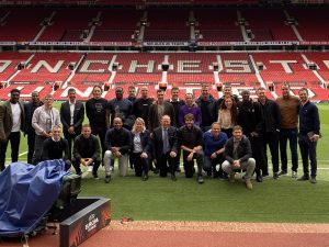 Christian Bordinggaard ved siden af Kaka og sammen med andre kendte på Old Trafford