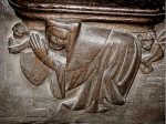 Cleric with devil and angel. Magdeburg Cathedral, Germany. Courtesy misericords.co.uk.