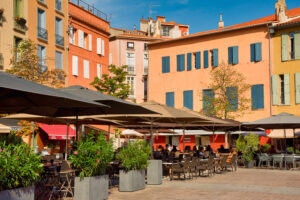 Colourful cafés in the sun on the Place de la République