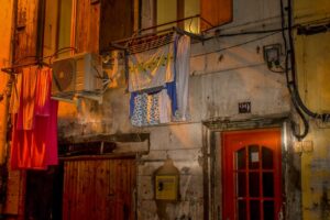 Laundry hanging at night in St. Jacques