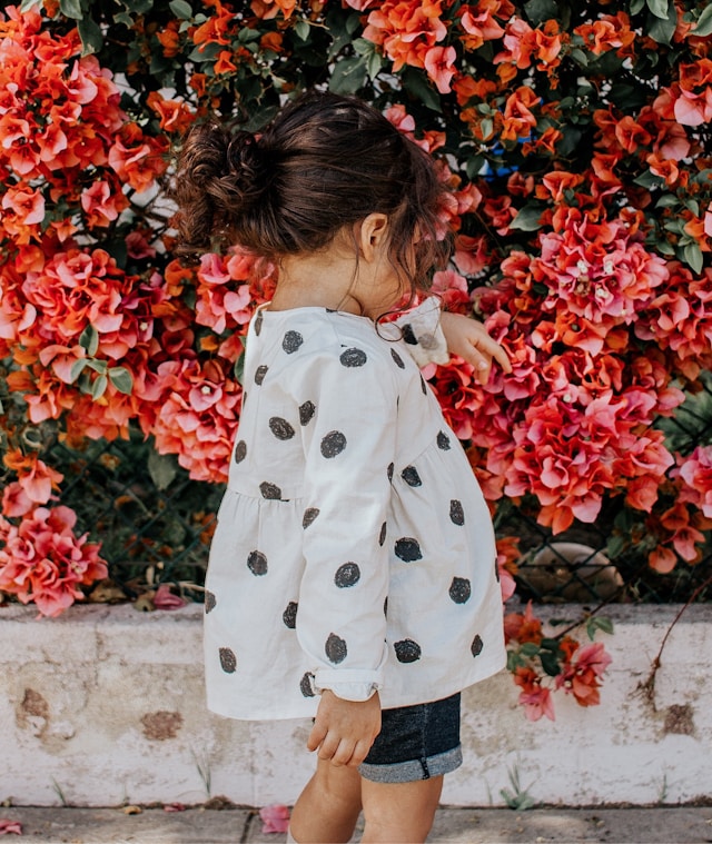 Girl in polkadot shirt