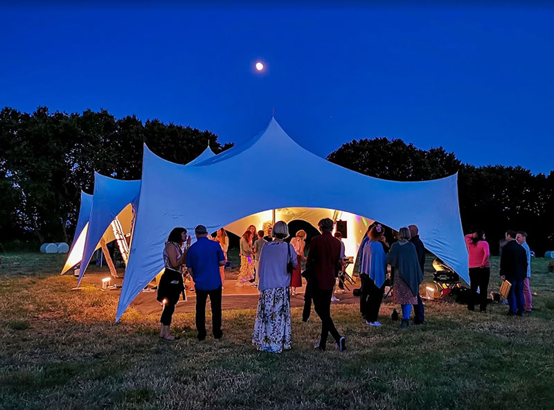 People dancing at a party at night in Bristol City.