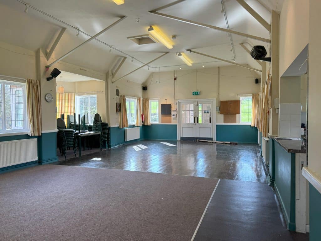 Inside view of East Tisted Village Hall - towards front door of hall.