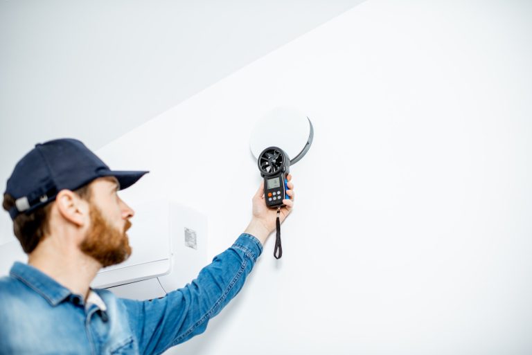 Handyman checking of air ventilation