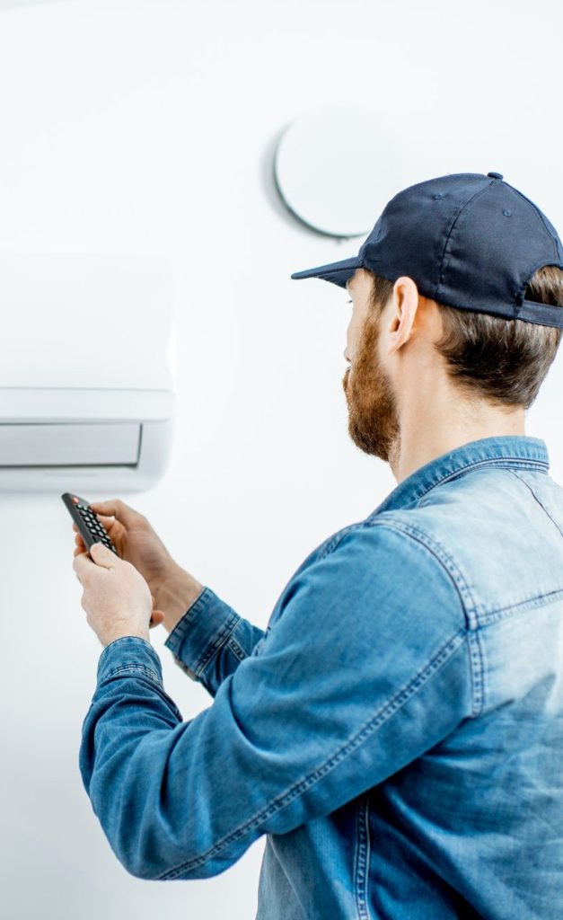 Man serving the air conditioner