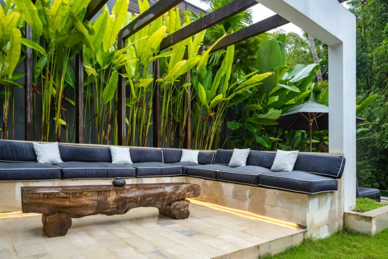 A couch sitting on top of a wooden platform