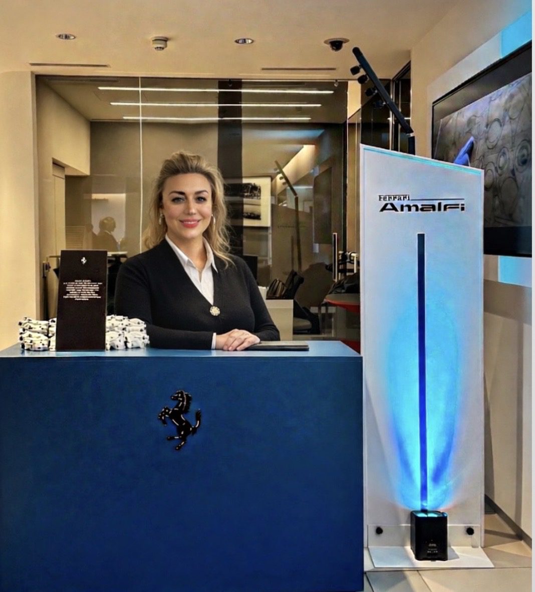 Ferrari Amalfi Roadshow Hostesses welcoming guests at a Ferrari dealership