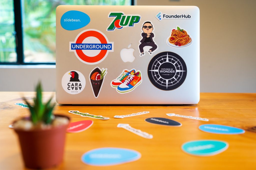 brand marketing logos on apple laptop