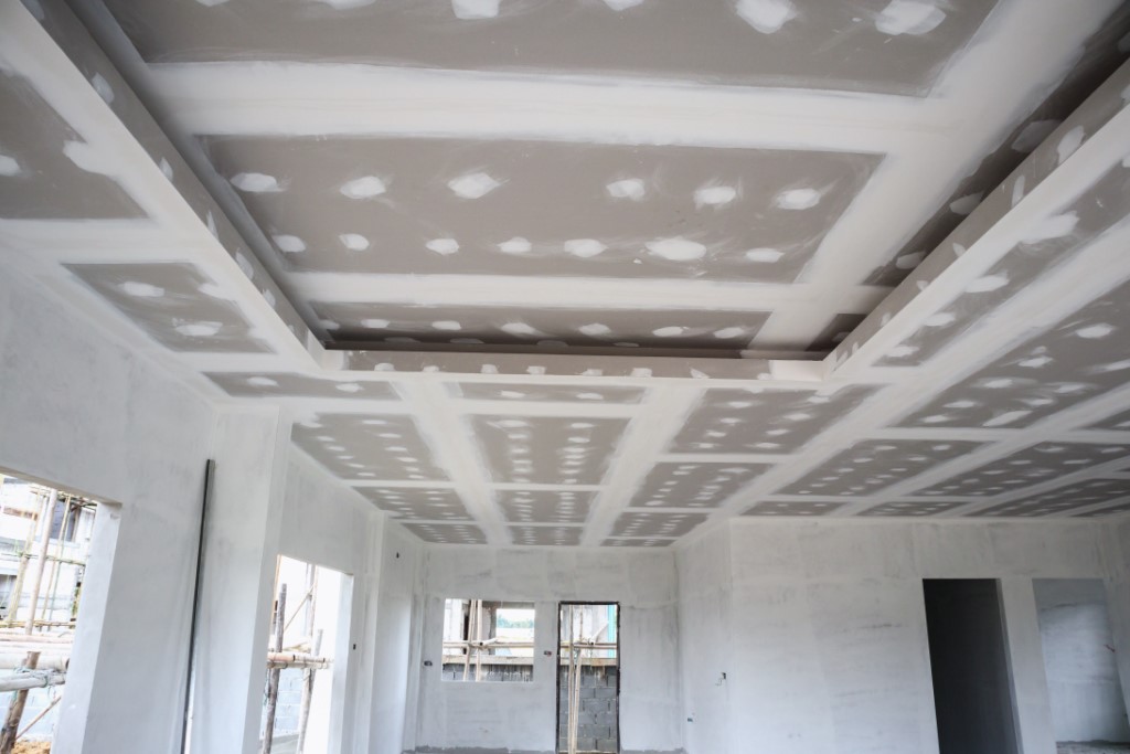 ceiling gypsum board installation at construction site
