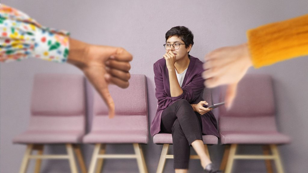 Autism in the workplace young autistic person getting the thumbs down