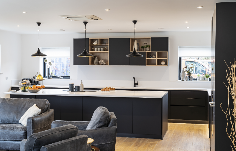 Kitchen Dining Interior behind two black sofa