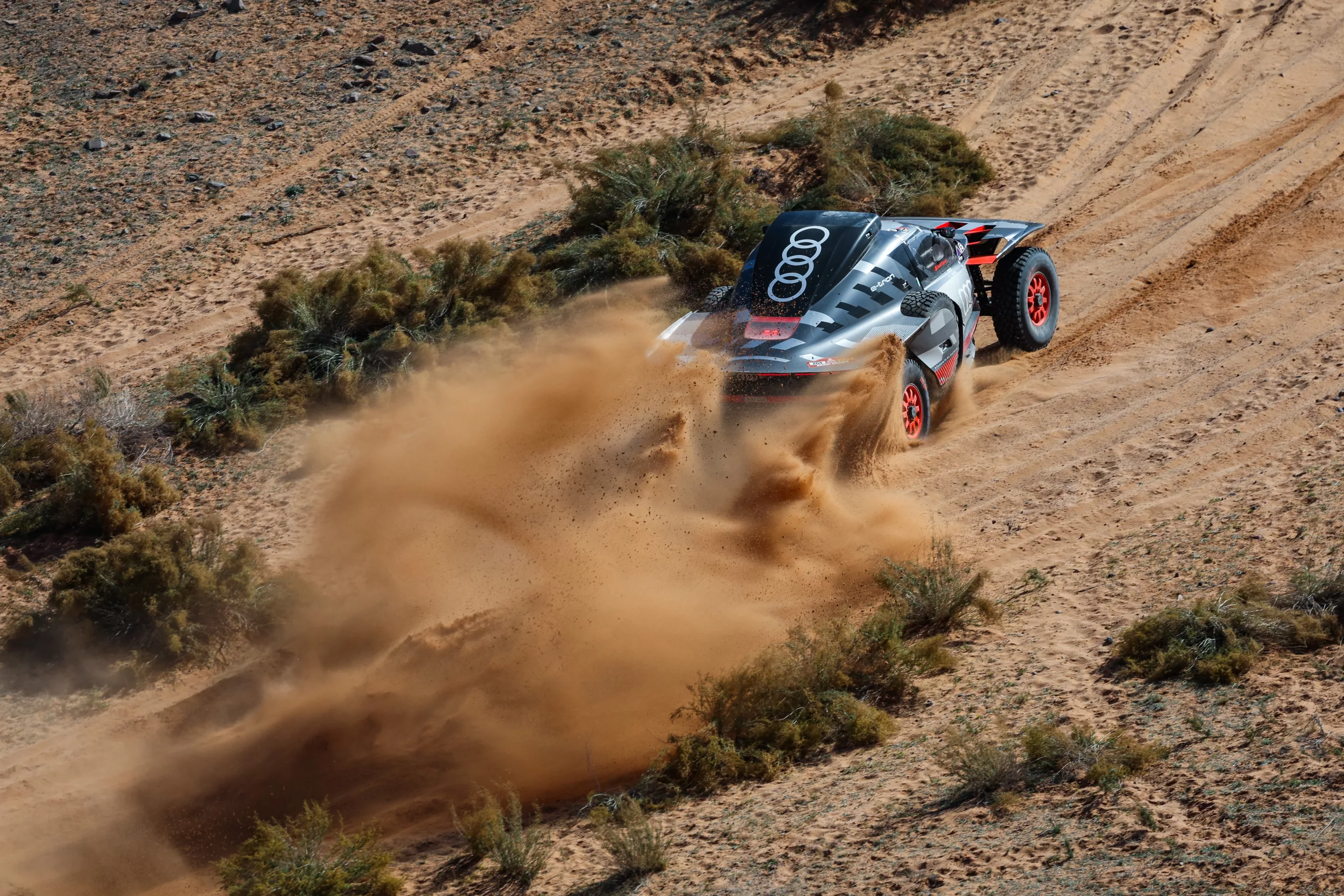 Carlos Sainz and Lucas Cruz on their Audi RS Q e-tron E2 of the Team Audi Sport during the Stage 9 of the Dakar 2024 on January 16, 2024 between Hail and Al Ula, Saudi Arabia // Red Bull Content Pool //