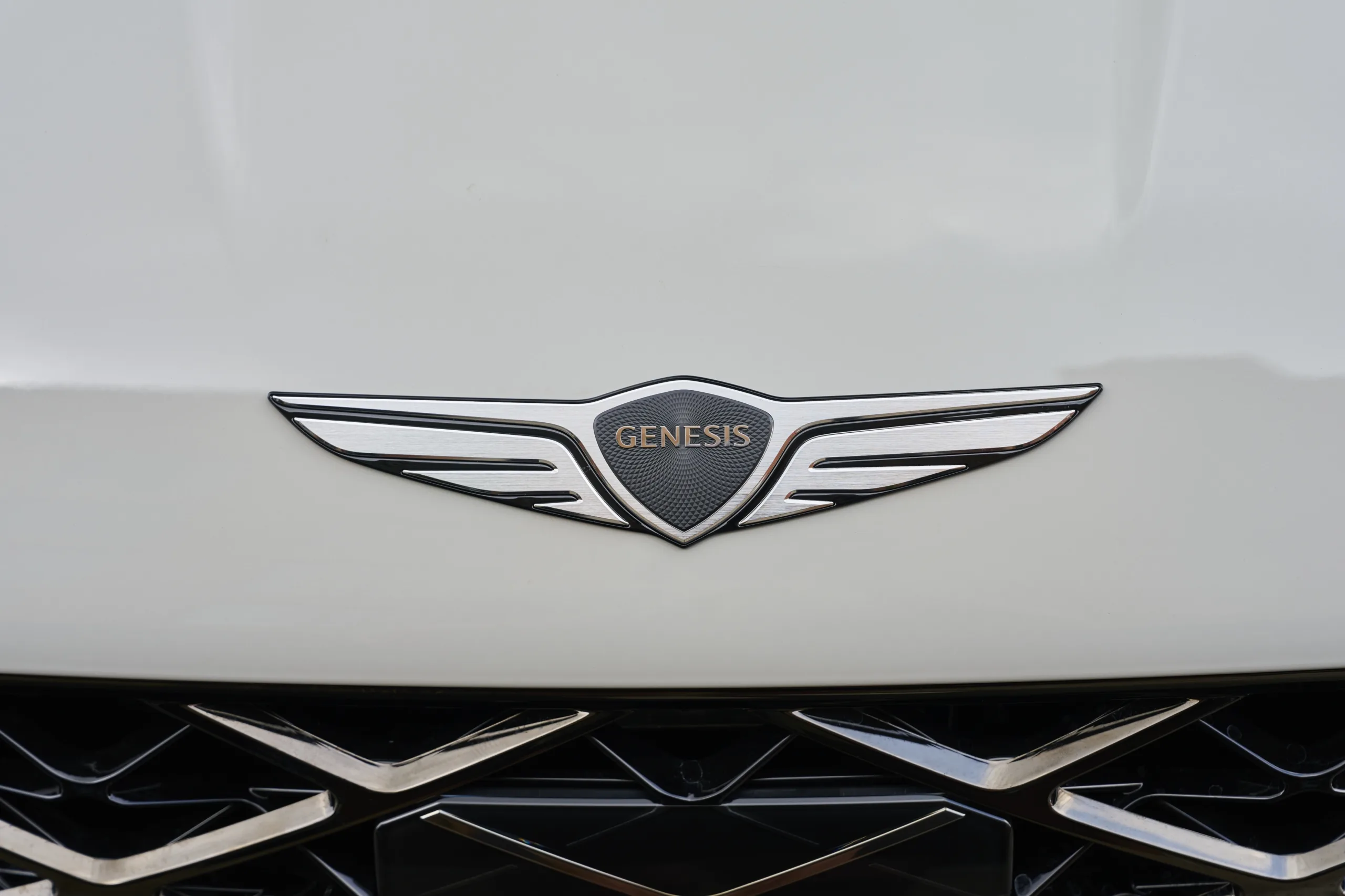 Logo van Genesis, het luxe premiummerk van Hyundai.