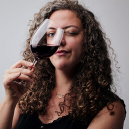 photographer eveline boone self portrait with a glass of red wine