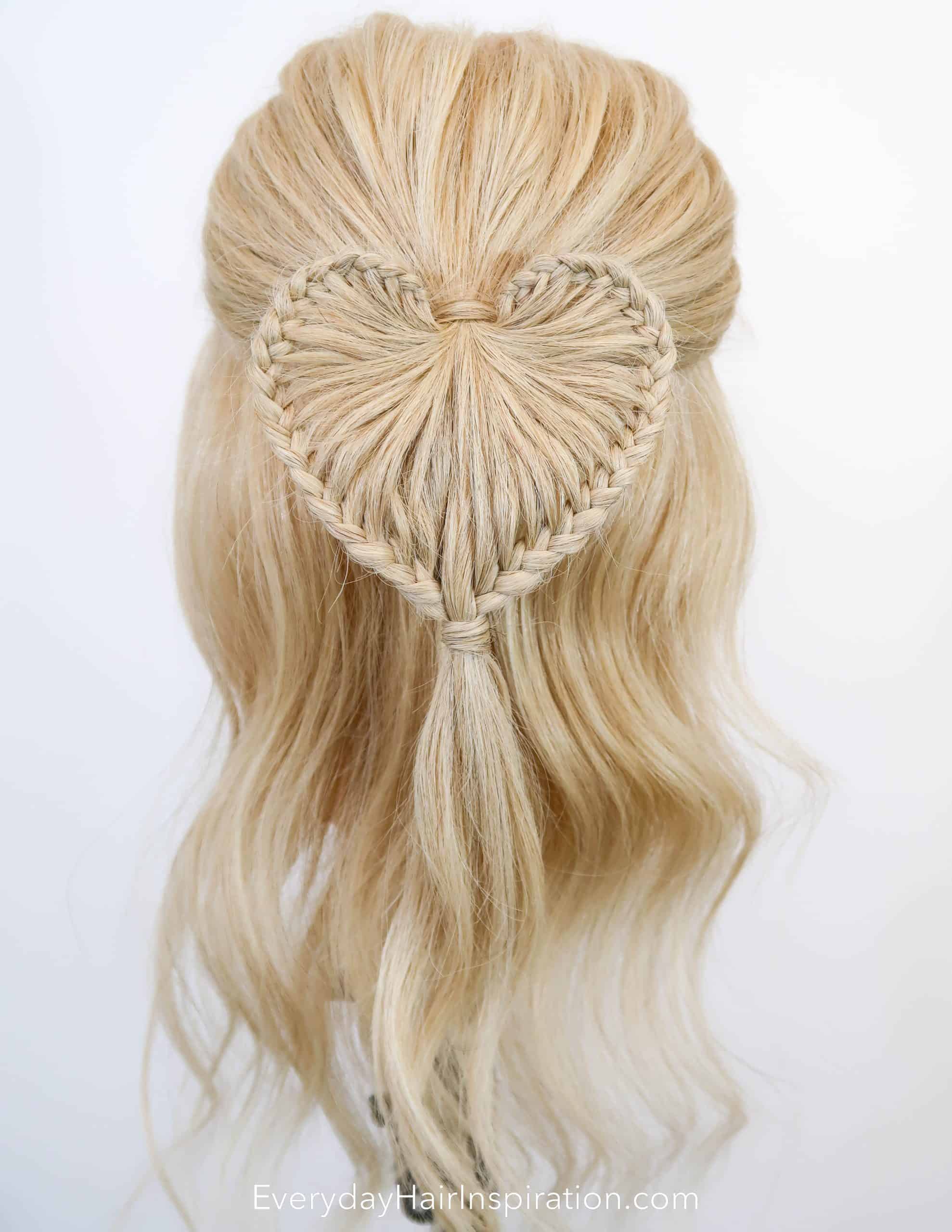Image of Half-up, half-down hairstyle with braids for Valentine's Day