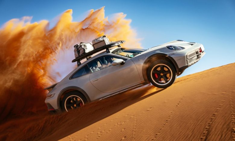 2023-Porsche-911-Dakar-in-Shade-Green-profile-rooster-tail.jpg