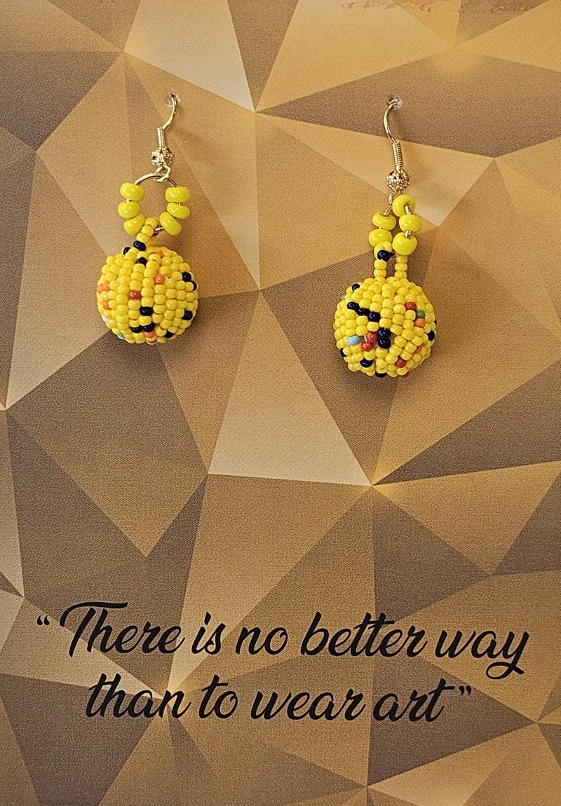 Yellow beads Evita Tjon A Ten