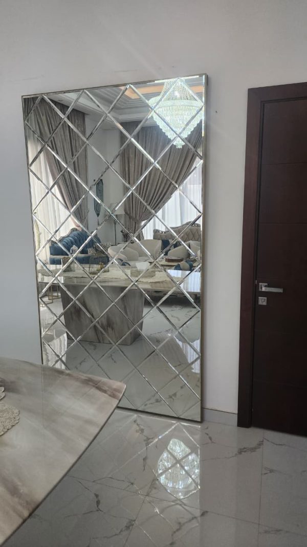 Gold Concealed sliding magic door with full-length mirror installed in Dubai and Abu Dhabi luxury homes, popular for kitchens and bathrooms