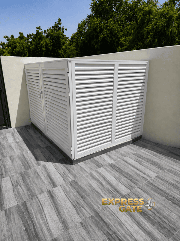 Custom outdoor louvered storage unit pool heater pump cabinet installed in Dubai and Abu Dhabi villas, featuring durable weather-resistant louver doors