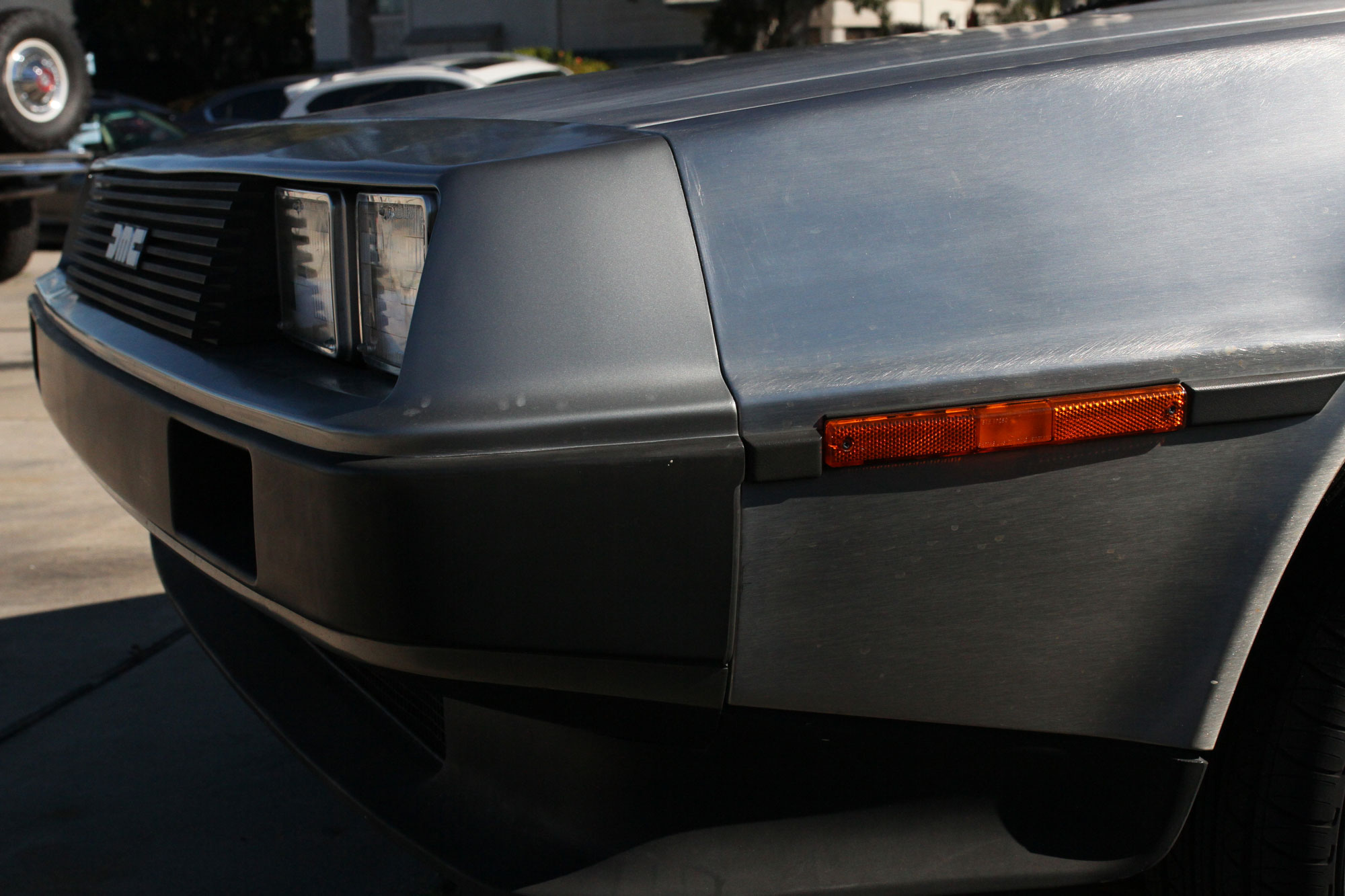 Front of the DeLorean - 1981 standing infront of the Ford Bronco